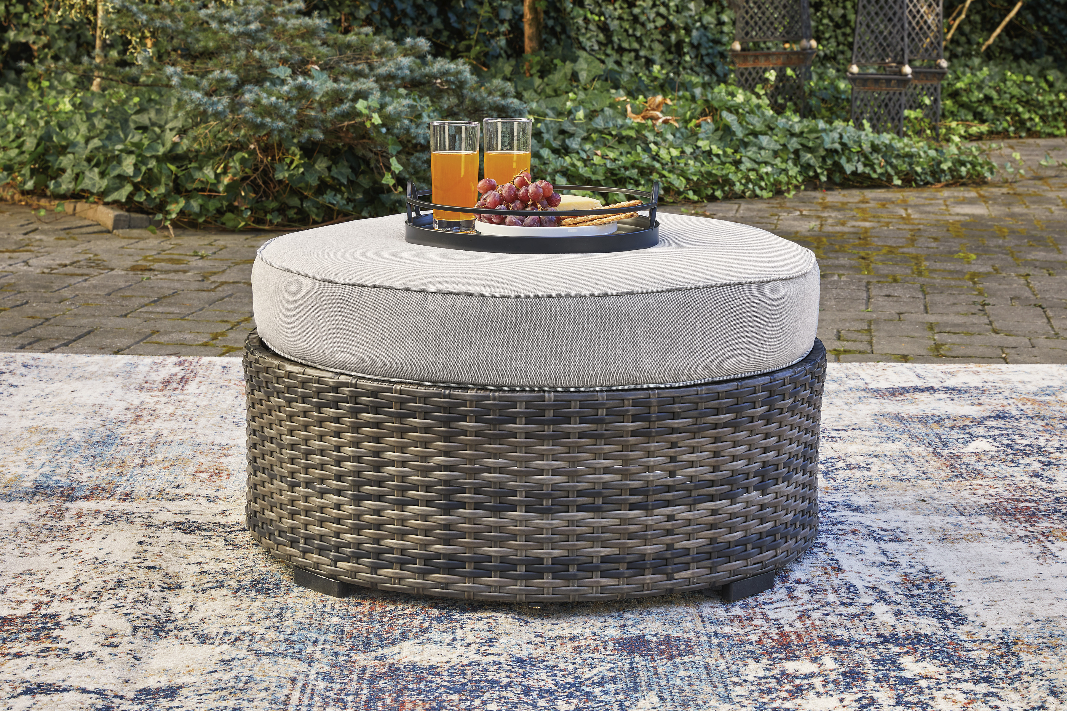 Signature Design by Ashley Harbor Court Ottoman with Cushion