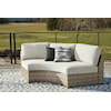 Signature Design Calworth Outdoor Curved Loveseat with Cushion
