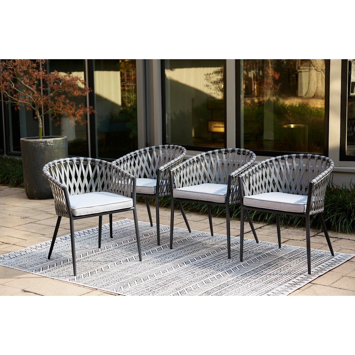 Ashley Furniture Signature Design Palm Bliss Outdoor Dining Chair (Set of 4)