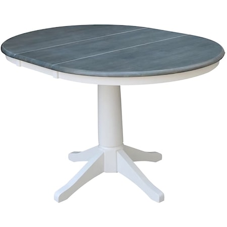 Round Pedestal Dining Table w/ Leaf