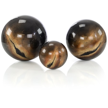 A Set of Three Decorative Lacero Balls