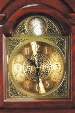 Elegantly Metal-Filigreed Clock Face with Standard Arabic Numerals
