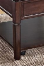 Tapered Notched Legs. Coffee Table Features Hidden Casters.