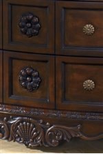 Embossed Wood Flowers and Wood Aprons with Flower like Drawer Handles on the Dresser