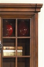 Thick Stepped Crown Moldings and Window Pane Glass Door are Found Throughout the Collection