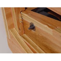 Adding a rear bolt to attach side seat rail to steel seat box. Double reinforcement.