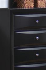 Sleek Chambered Drawer Fronts Accented with Brushed Chrome Knobs