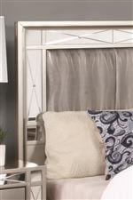 The Headboard Showcases the Etched Mirror Panels Featured Throughout the Collection, as well as the Metallic Leatherette