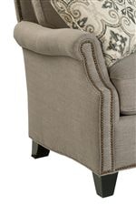 Seats Are Hugged by Tightly Rolled Arms with Sloped Detailing