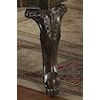 Detailed Carvings are Featured on Legs and Table Edge