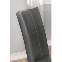 Grey faux leather seat with accent stitching