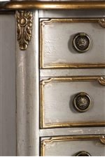 Carved Corner Pieces and Gilded Edging