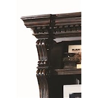 Ornately Carved Columns and Crown Moulded Case Tops