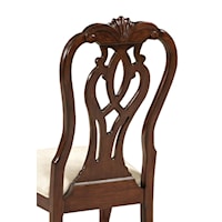 18th Century Influence Can Be Seen in the Classically Carved Splat Back Chairs