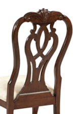 18th Century Influence Can Be Seen in the Classically Carved Splat Back Chairs