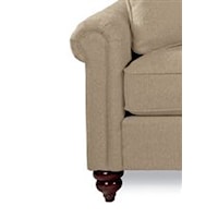 Rolled Panel Arms and Turned Legs are Subtle Touches of Formality That Enhance a Cozy Sofa