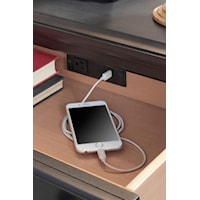 Features like built-in outlets add modern convenience