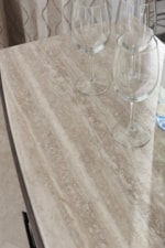 Silver Travertine Tops Are Featured on a Number of Pieces, Creating an Inviting, Casual Feel