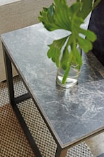 Select pieces feature the bold, natural texture of Bahia marble
