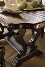 Nail head trim on the Sienna Bistro Table is featured on pieces throughout the collection