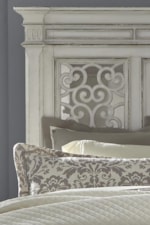 Panel Headboard With Decorative Gird Overlay Over Mirrored Panels