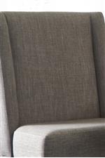 Chair back fully upholstered in gray linen