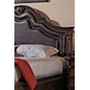 Headboard Centerpiece is Upholstered in Dark Brown Faux Leather with Nailhead Detailing 