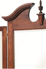 Center Finnial and Arched Top with Decorative Cutouts and Molding Details