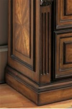 Thick Base Moldings, Interesting Veneers, Carved Columns are Featured in the Collection