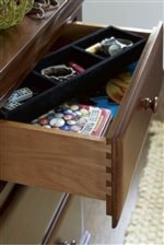 Dovetail Joinery Ensures Sturdy Drawers, While Features like Jewelry Trays Encourage Organization