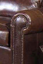 Wide Bold Flared Arms Are Adorned in Nailhead Trim