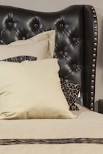 The Upholstered Bed Combines Deep Tufts with Gem-Like Buttons for a Look that is Steeped in Tradition and Elegance