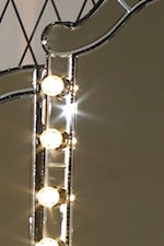 Light Bulbs Line Along Center of Vanity Mirror