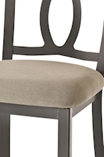 Sturdy Metal Strength Meets Soft Padded Upholstery, Creating Quaint Cottage Design Through the Combination of Opposites