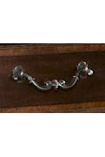 Custom cast hardware in an antique brass, aged patina finish
