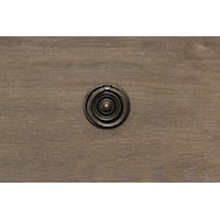 Simple Round Knobs in a Blackened Cast Iron Finish on Drawers and Doors