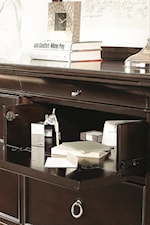 Drop Down Drawers Create an Alternate Storage Option that is Highly Convenient for Books or Media. Select Drop-Downs are Complete with Wire Management.
