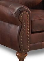 Rolled Arm and Nailhead-Studded Faceplates Flow into Turned Wood Legs