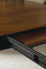 Two Twenty Four Inch Self Storing Leaves that Extends the Table to 152 Inches