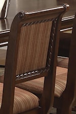 Seat Back Features Subtle Curves, Carved Detail and Attractive Striped Upholstery