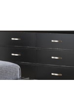 Silver Hardware Pulls Adorn Each Drawer of the Dresser