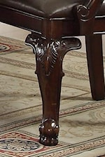 Detailed Carvings are Featured on Legs and Table Edge