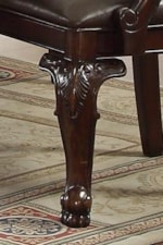 Detailed Carvings are Featured on Legs and Table Edge