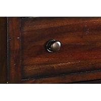 Round Brass-Finished Metal Knobs on Drawers