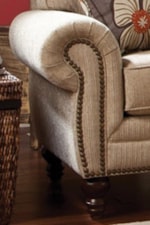 Traditional Rolled Arms with Nail Head Trim Add Classic Elegance to a Living Room Display