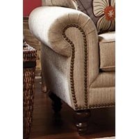 Traditional Rolled Arms with Nail Head Trim Add Classic Elegance to a Living Room Display