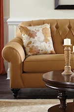 Classic Accents Like Button Tufting, Exposed Wood Feet and Welt Cords Offer Elegance but Maintain a Casual Ambiance