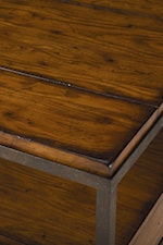 Distressed Woodwork Rests in Metal Frame