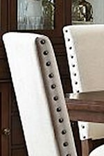 Nailhead Trim Decorates the Side of the Chairs
