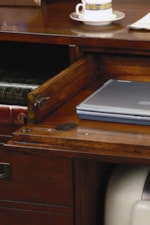 Keyboard and laptop drop-front on desk